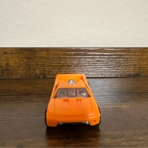 2003 hot wheels 1186 MJ 1 NL f26. Orange Stunt Team - Blue Rims